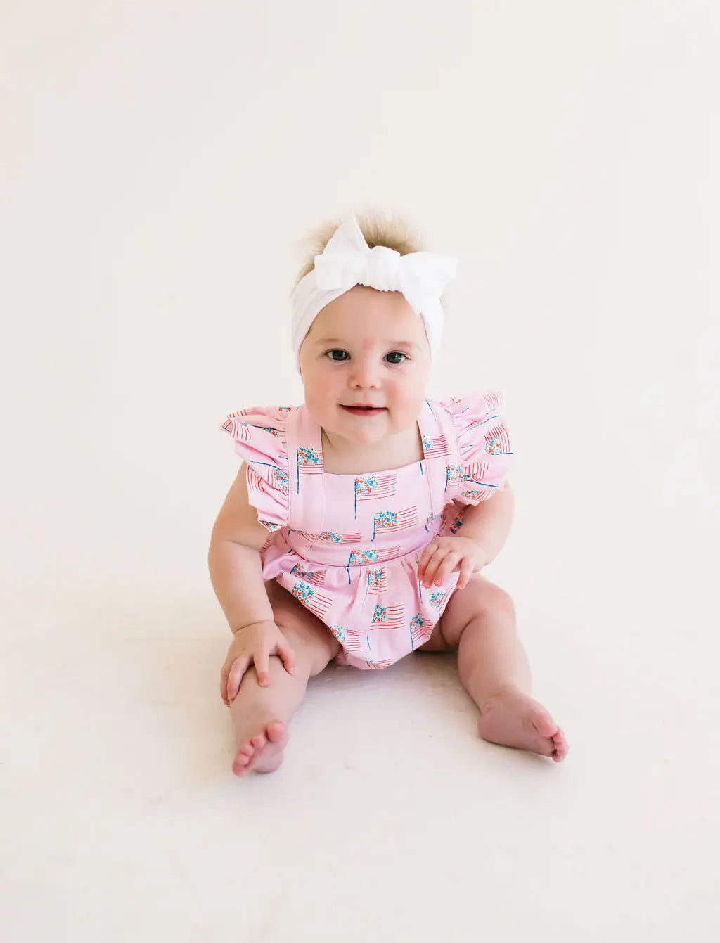Emmy Bubble Romper in Pink Flags