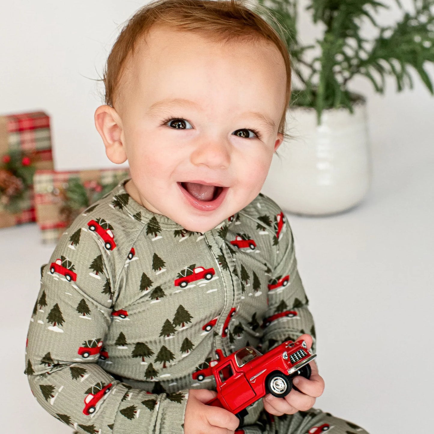 Bamboo Zip Sleeper w Fold-Over Feet | Red Christmas Trucks (Small Ribbed)