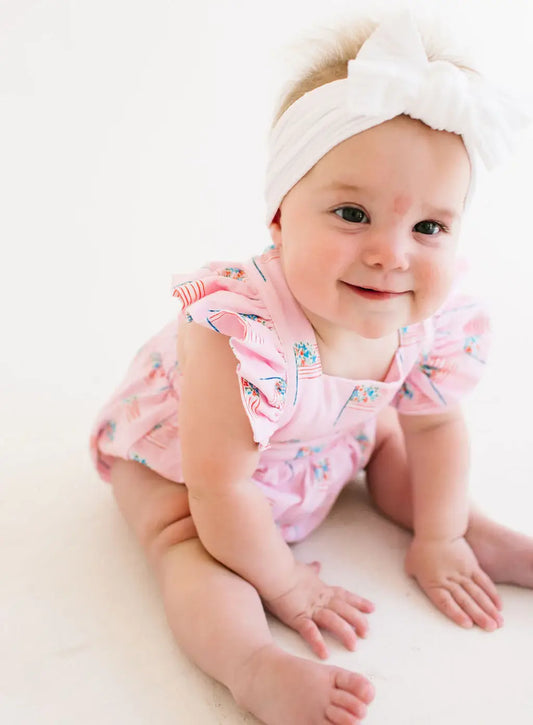 Emmy Bubble Romper in Pink Flags